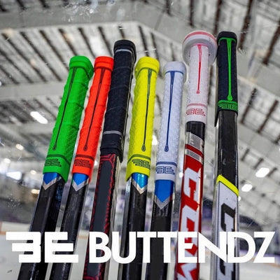 Buttendz line-up of hockey stick grip products against a background of the inside of the hockey arena.